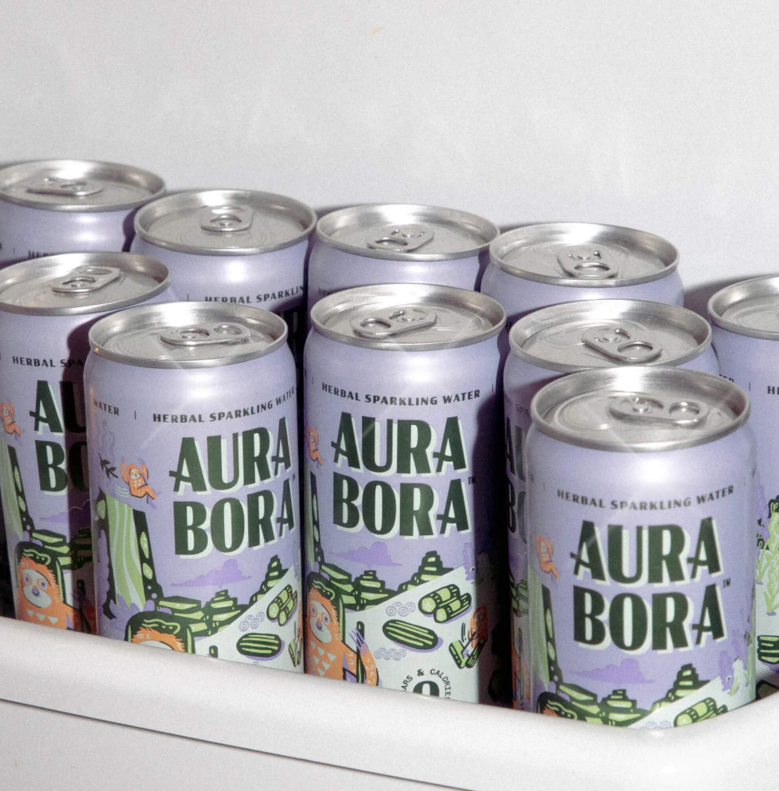 Fridge shelf stocked with Aura Bora sparkling water
